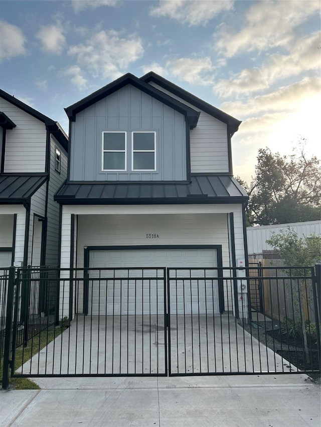 view of front of property featuring a garage