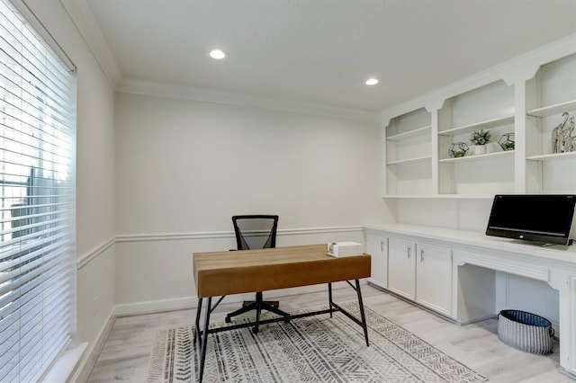 office area featuring crown molding and light hardwood / wood-style floors