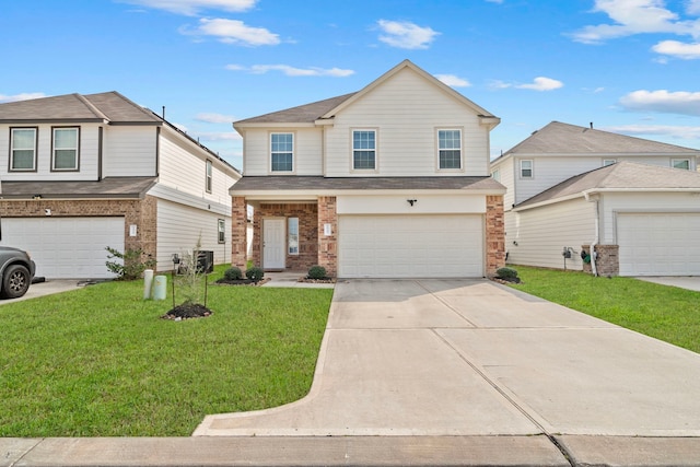 view of front of house featuring a garage and a front yard