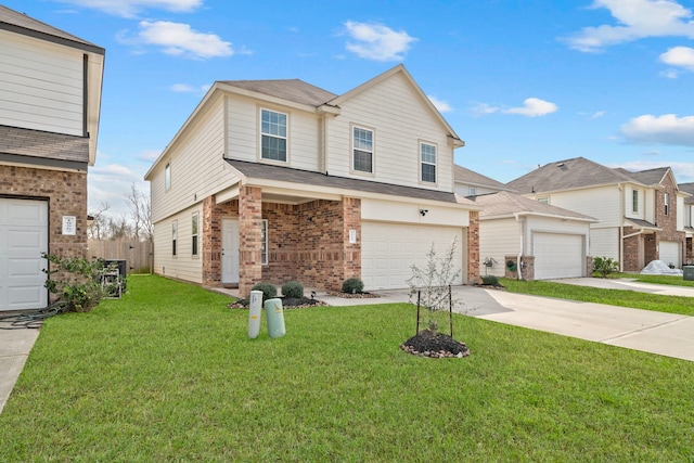 view of front of property featuring a garage and a front yard