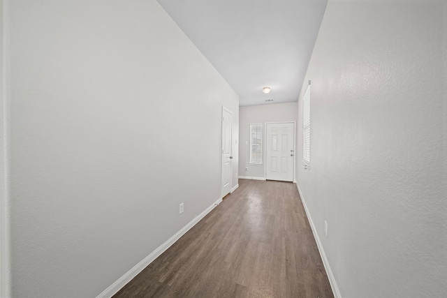 hall featuring dark hardwood / wood-style floors