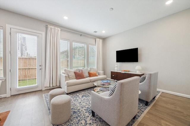 living room with light hardwood / wood-style floors