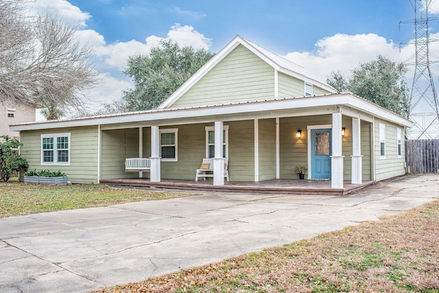 view of front of property featuring covered porch