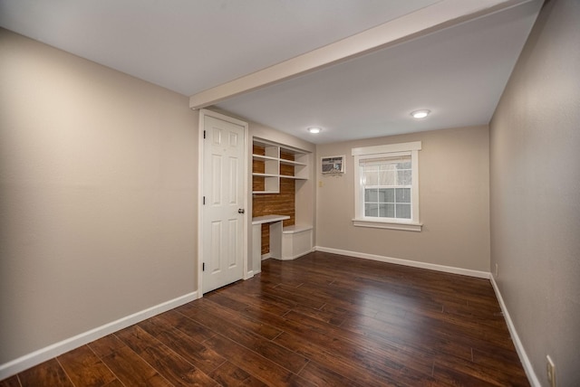 unfurnished room featuring dark wood-type flooring