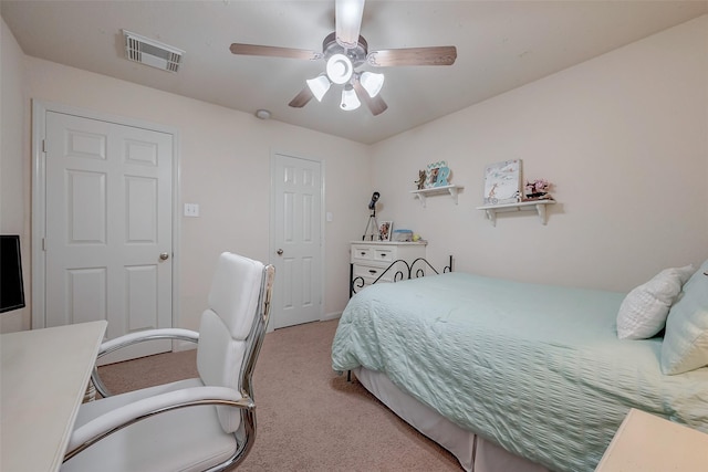 bedroom featuring carpet, visible vents, and ceiling fan