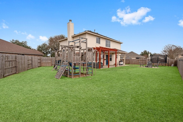 rear view of house with a pergola, a fenced backyard, a chimney, a yard, and a playground