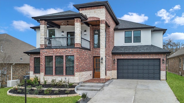 view of front of property featuring a garage and a balcony