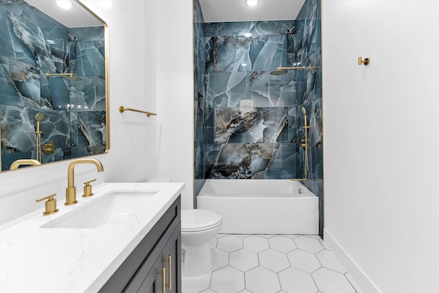 full bathroom with tiled shower / bath combo, vanity, tile patterned flooring, and toilet