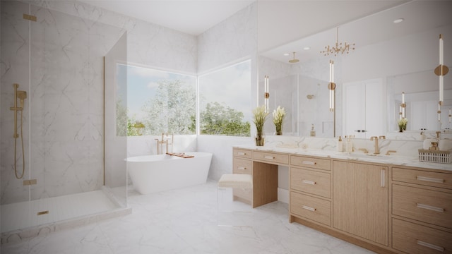 bathroom featuring vanity, independent shower and bath, and an inviting chandelier