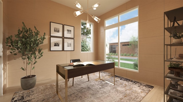 office space featuring hardwood / wood-style floors and a chandelier