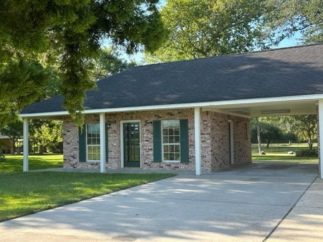 view of property's community with a yard