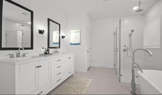 bathroom with plus walk in shower and vanity