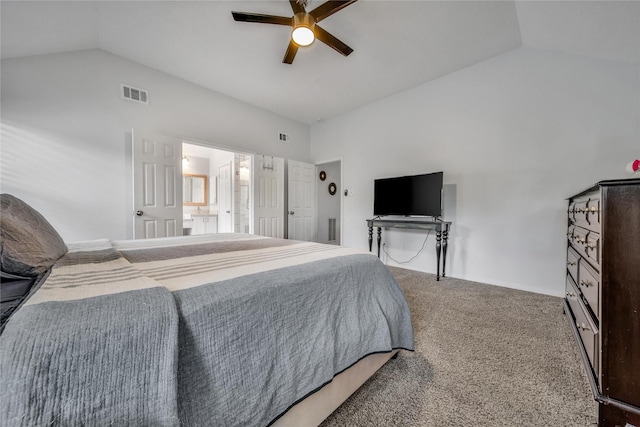 carpeted bedroom featuring ceiling fan, connected bathroom, and vaulted ceiling