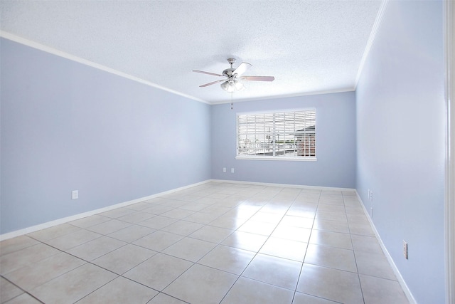 tiled spare room with ceiling fan, ornamental molding, and a textured ceiling