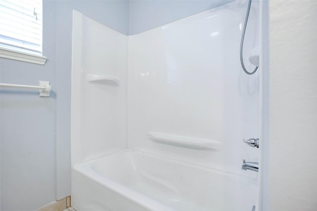 bathroom with shower / bathtub combination