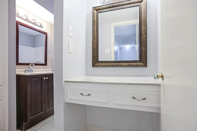 bathroom with vanity and tile patterned floors