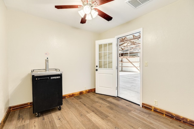 interior space with ceiling fan and light wood-type flooring