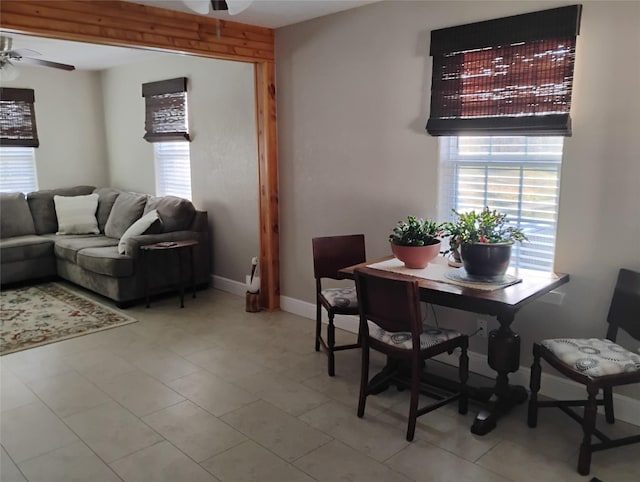 dining space featuring ceiling fan