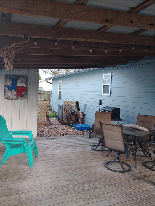 wooden deck with area for grilling