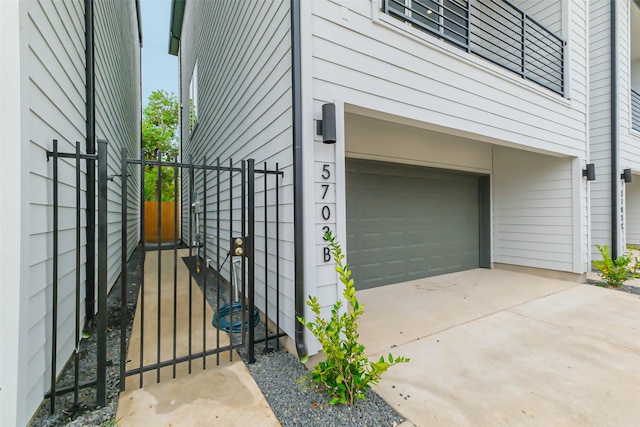 view of property exterior featuring a garage