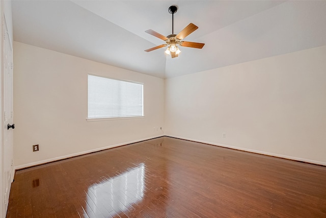 unfurnished room with ceiling fan, wood-type flooring, and vaulted ceiling