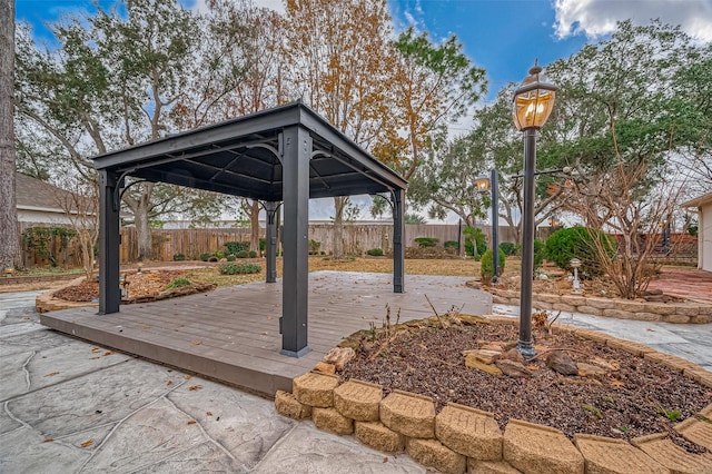 view of patio / terrace with a gazebo and a deck