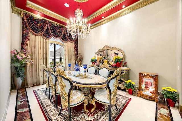 dining area featuring a raised ceiling, crown molding, tile patterned flooring, and a chandelier