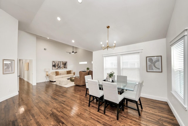 1819 Studewood St, Houston, TX 77008 - dining area featuring vaulted ceiling, a chandelier, dark wood-type flooring, recessed lighting, and baseboards