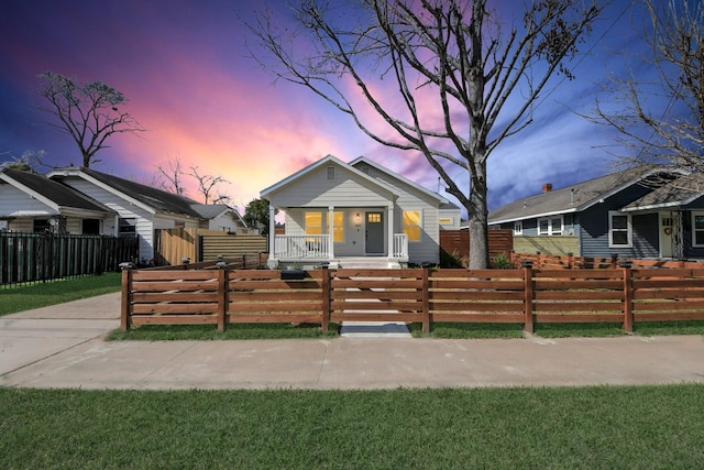 1819 Studewood St, Houston, TX 77008 - bungalow-style home featuring a porch and a fenced front yard