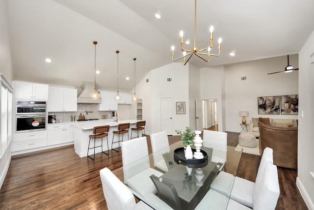 1819 Studewood St, Houston, TX 77008 - dining room featuring dark wood-type flooring, a chandelier, high vaulted ceiling, and recessed lighting