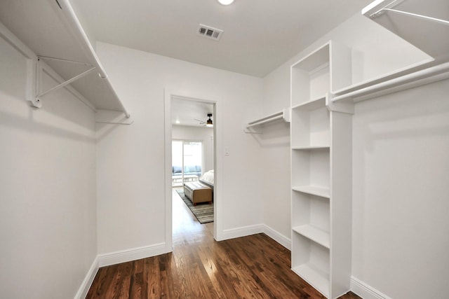 1819 Studewood St, Houston, TX 77008 - walk in closet with dark wood-style floors