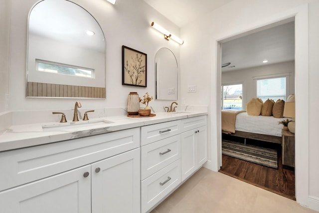1819 Studewood St, Houston, TX 77008 - ensuite bathroom featuring double vanity and recessed lighting
