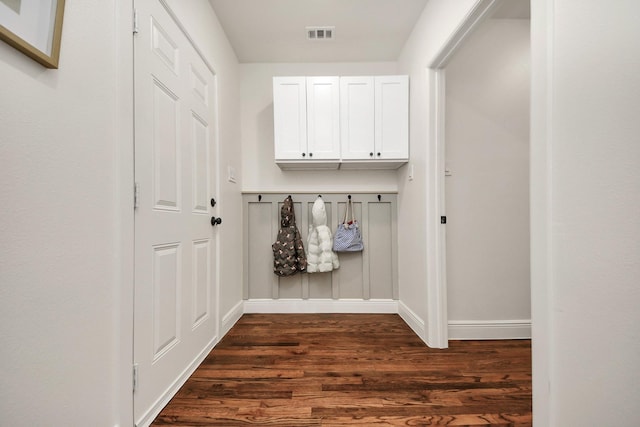 1819 Studewood St, Houston, TX 77008 - mudroom with dark wood-style flooring and baseboards