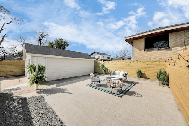 1819 Studewood St, Houston, TX 77008 - view of patio / terrace featuring a fenced backyard, an outdoor living space, and an outdoor structure
