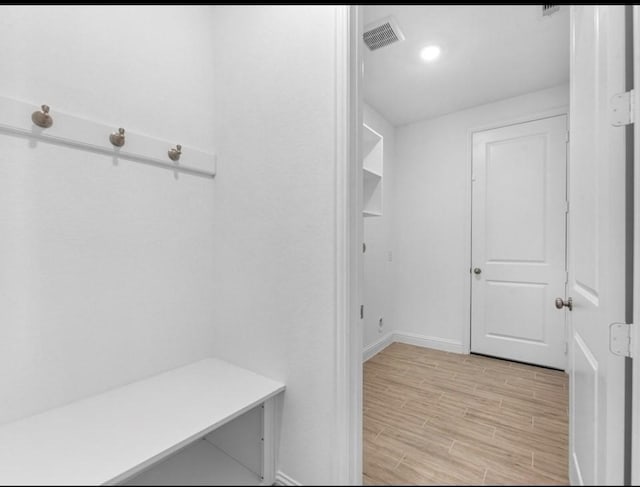 mudroom with light wood-type flooring