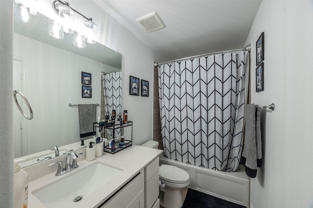 full bathroom featuring vanity, toilet, and shower / tub combo