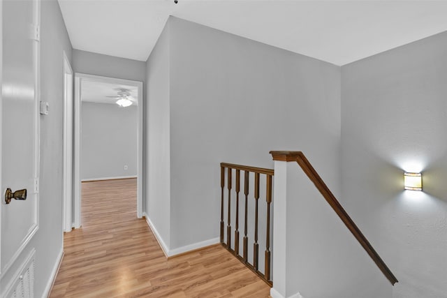 hall with light wood-type flooring