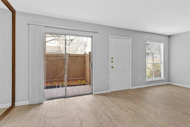 entryway with light hardwood / wood-style flooring