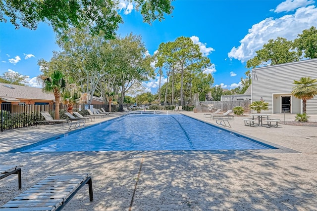 view of swimming pool featuring a patio