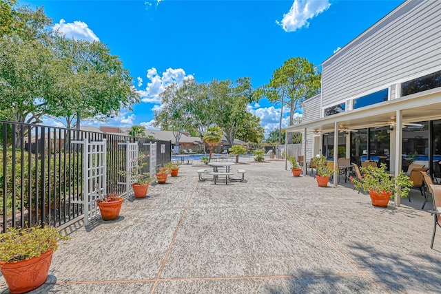 surrounding community with a patio area