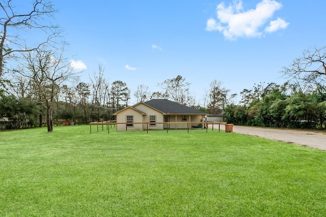 view of front facade with a front yard