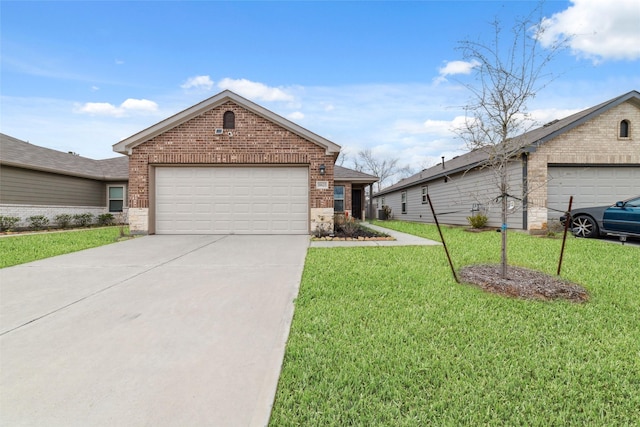 view of front of house featuring a garage and a front lawn