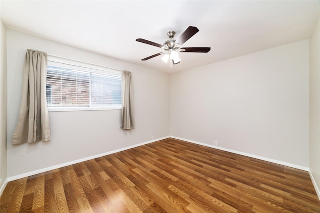 unfurnished room with hardwood / wood-style flooring and ceiling fan