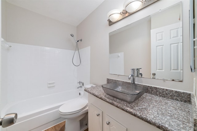 full bathroom with shower / tub combination, vanity, and toilet