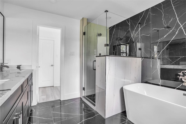 bathroom featuring vanity, shower with separate bathtub, and tile walls