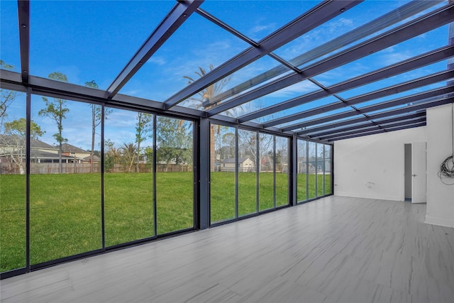 unfurnished sunroom with a healthy amount of sunlight