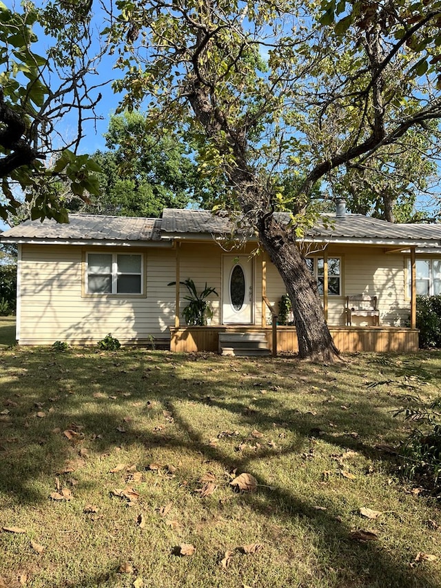 ranch-style house with a front lawn