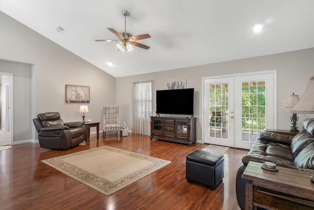 living room with french doors, plenty of natural light, and hardwood / wood-style floors