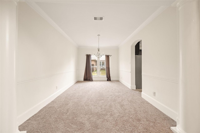 unfurnished dining area featuring arched walkways, light colored carpet, visible vents, ornamental molding, and a chandelier