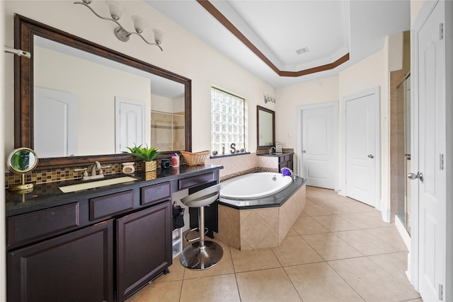 bathroom featuring tasteful backsplash, tile patterned floors, visible vents, a shower stall, and a bath